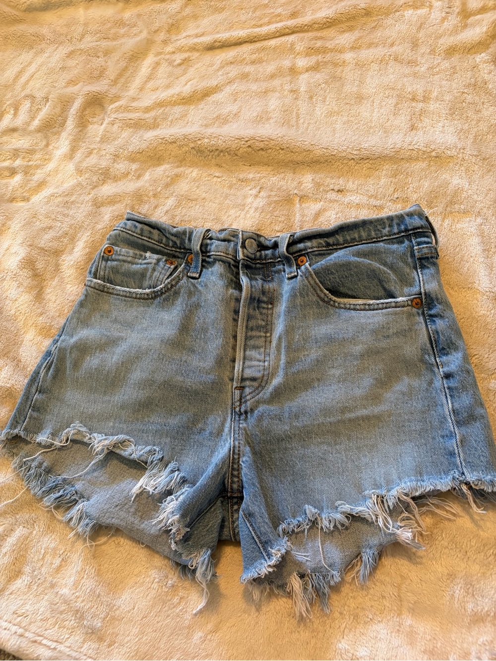 Levi’s Light Blue Distressed Denim Cutoff Shorts